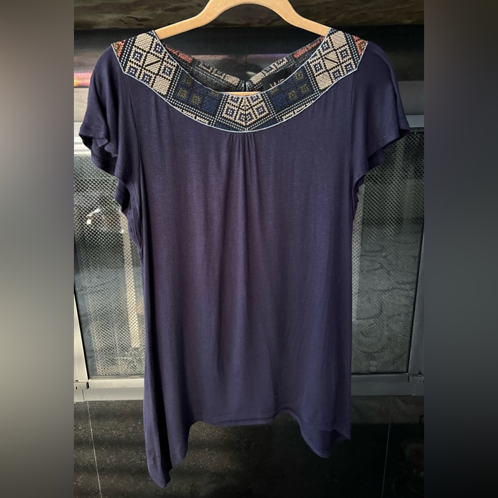 W5 Short Sleeve Blouse with embroidered neck line, tassels on the back